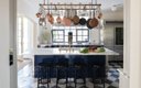 Kitchen with hanging pots and pans